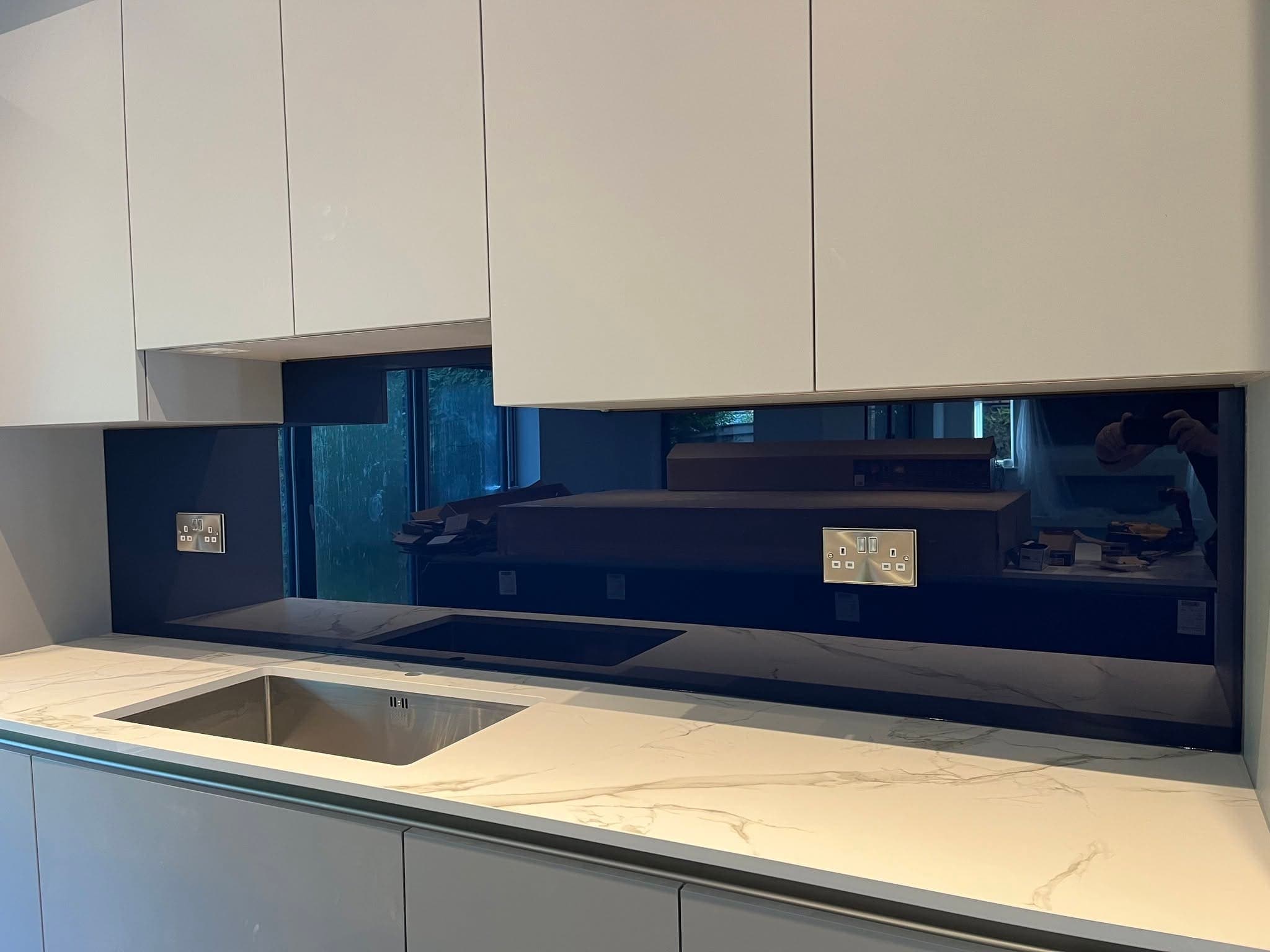 Black glass kitchen splashback